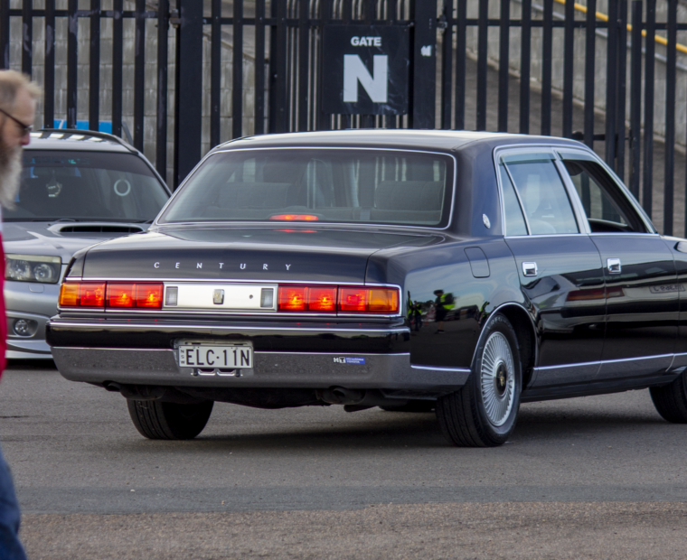 Black Century seen rolling into car show.