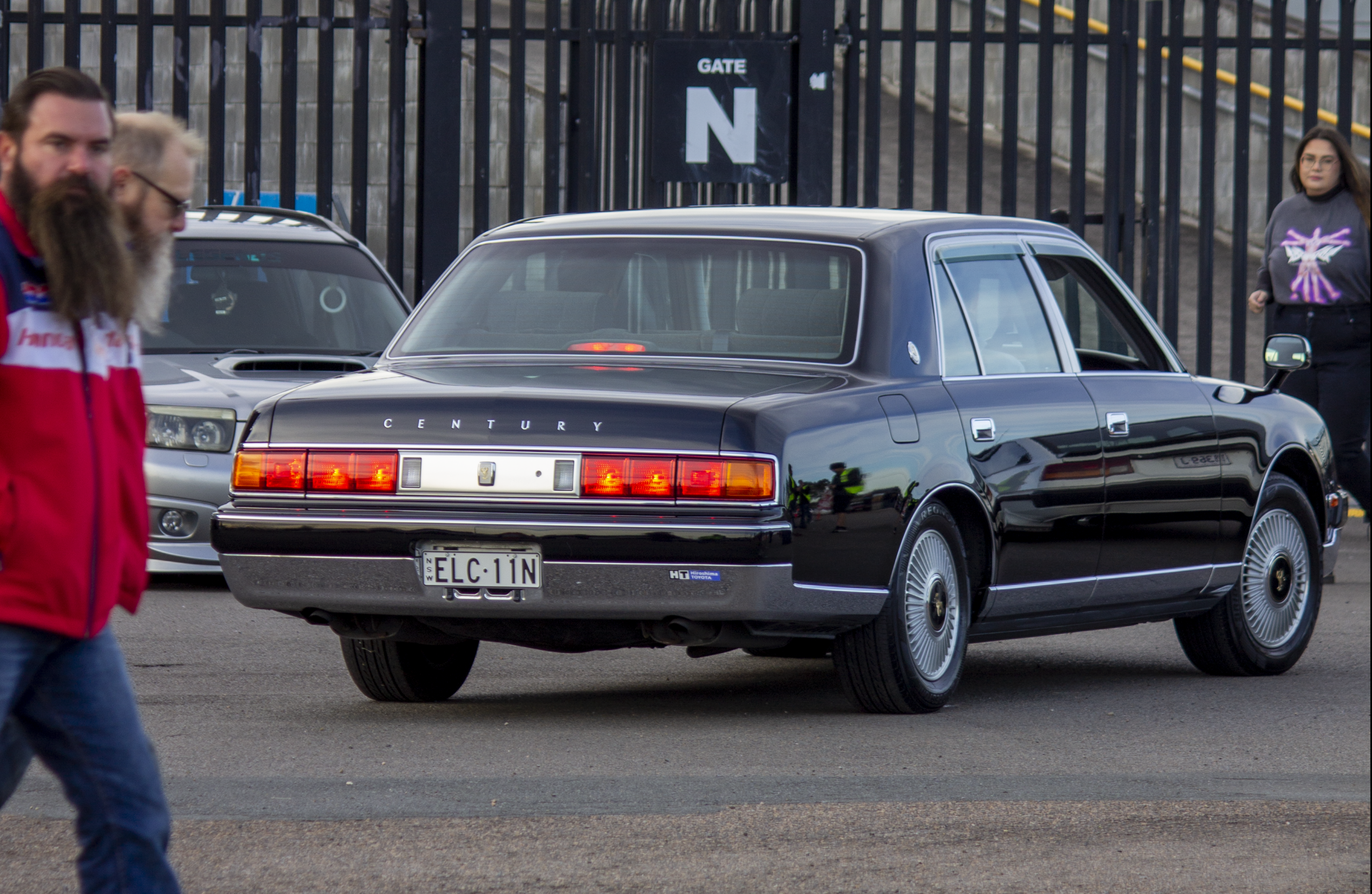 Black Century seen rolling into car show.