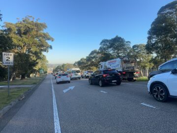 Lengthy traffic delays after 21yo woman struck by stolen car.