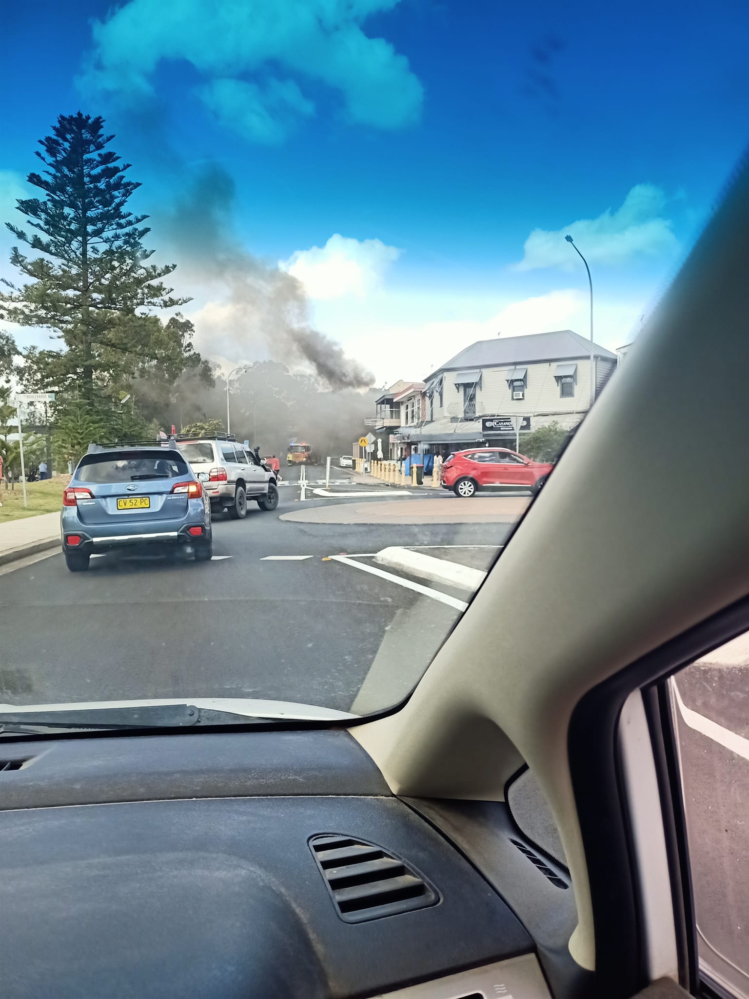 A photo showing smoke issuing from the building from the road. Image by Sasha Wisz