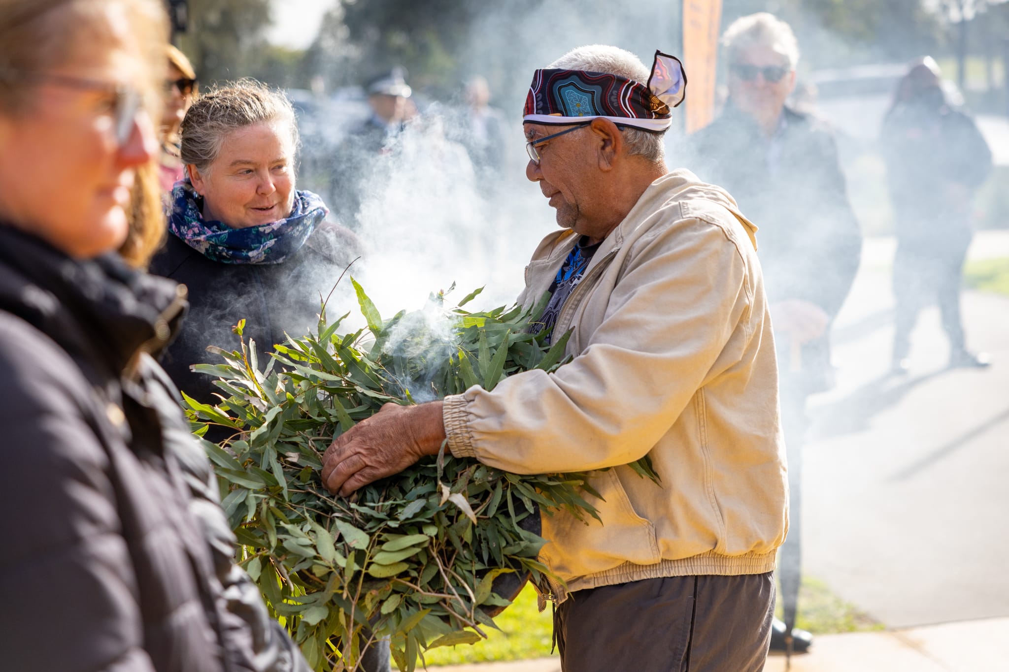28186_Uncle Norm Archibald conducting the smoking ceremony at the NAIDOC Week event
