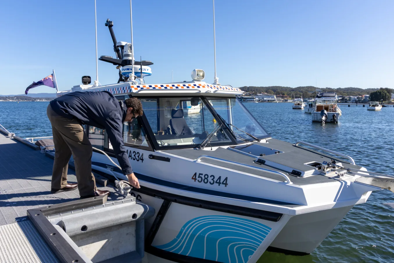 28733_A NSW Maritime boat moors at the wharf