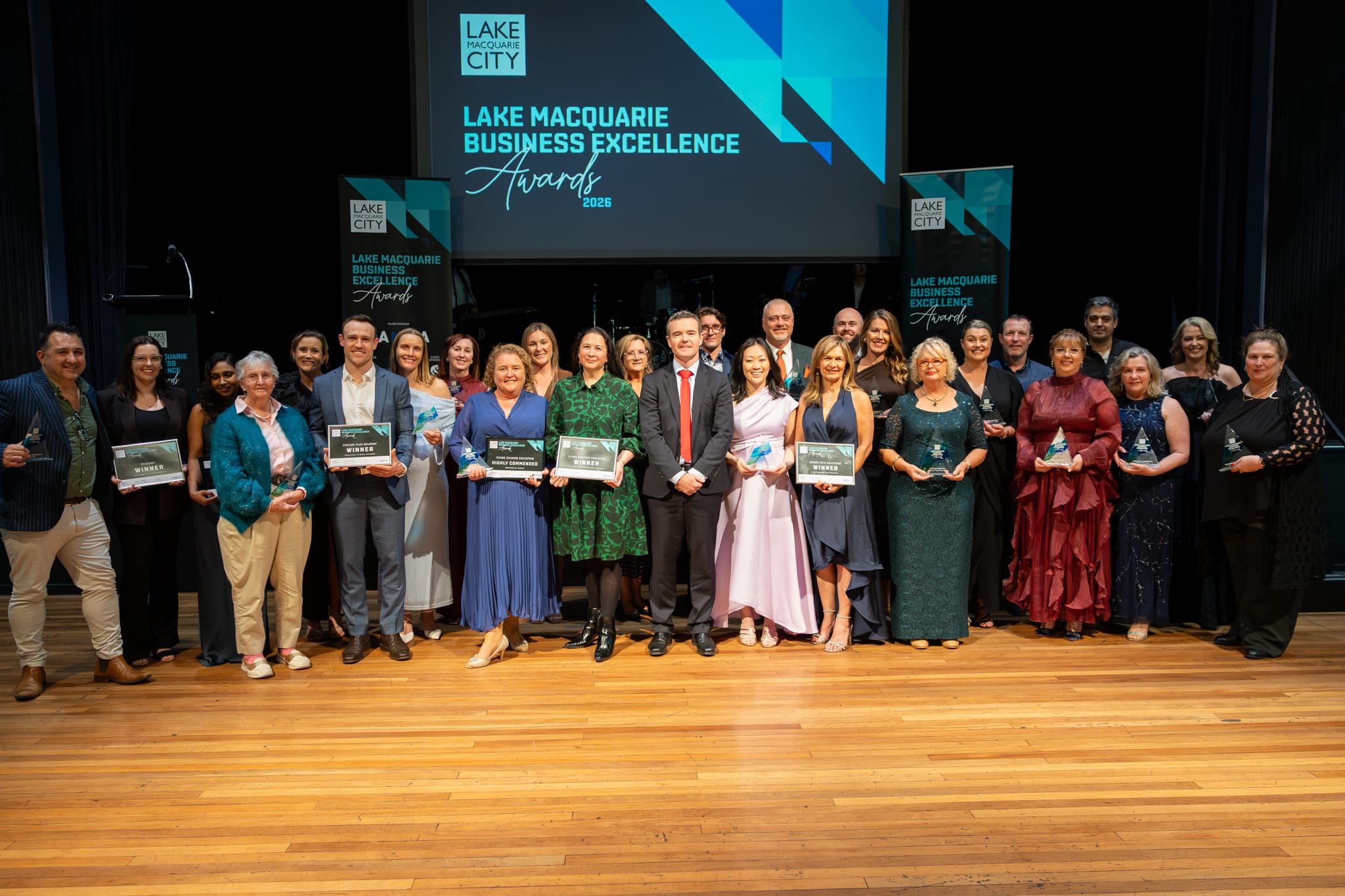 28962_Lake Macquarie Mayor Adam Shultz with winners from Friday night's ceremony