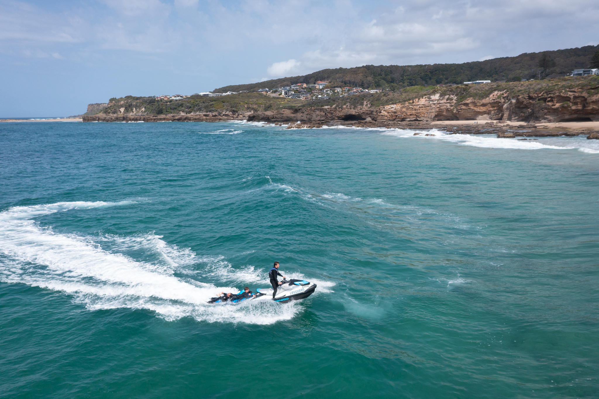 31702_Lifeguards practice jet-ski rescues off Caves Beach