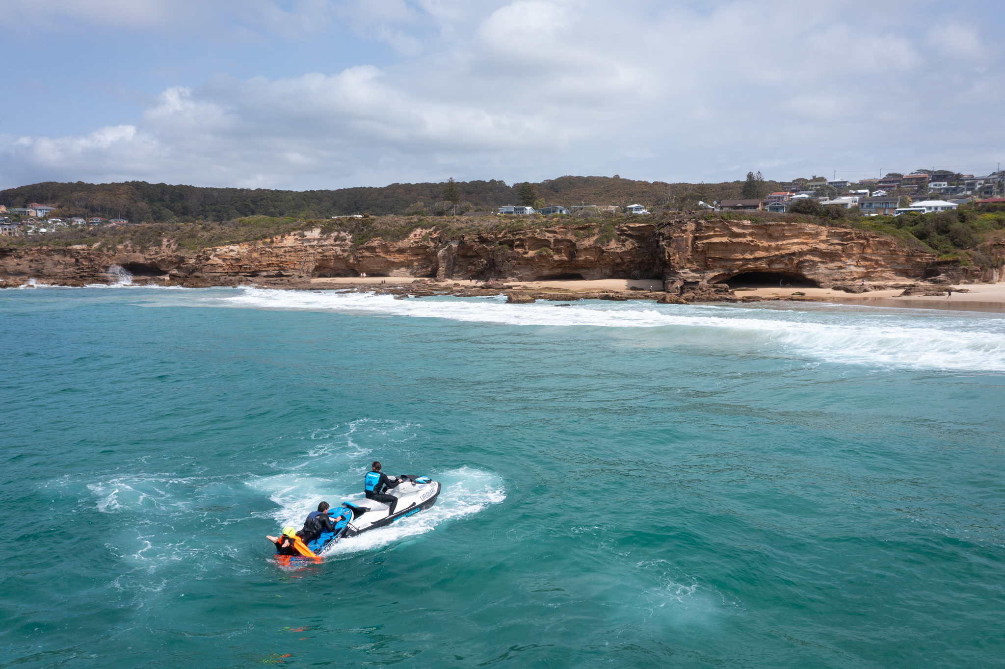 31702_Lifeguards practice jet-ski rescues with a weighted dummy
