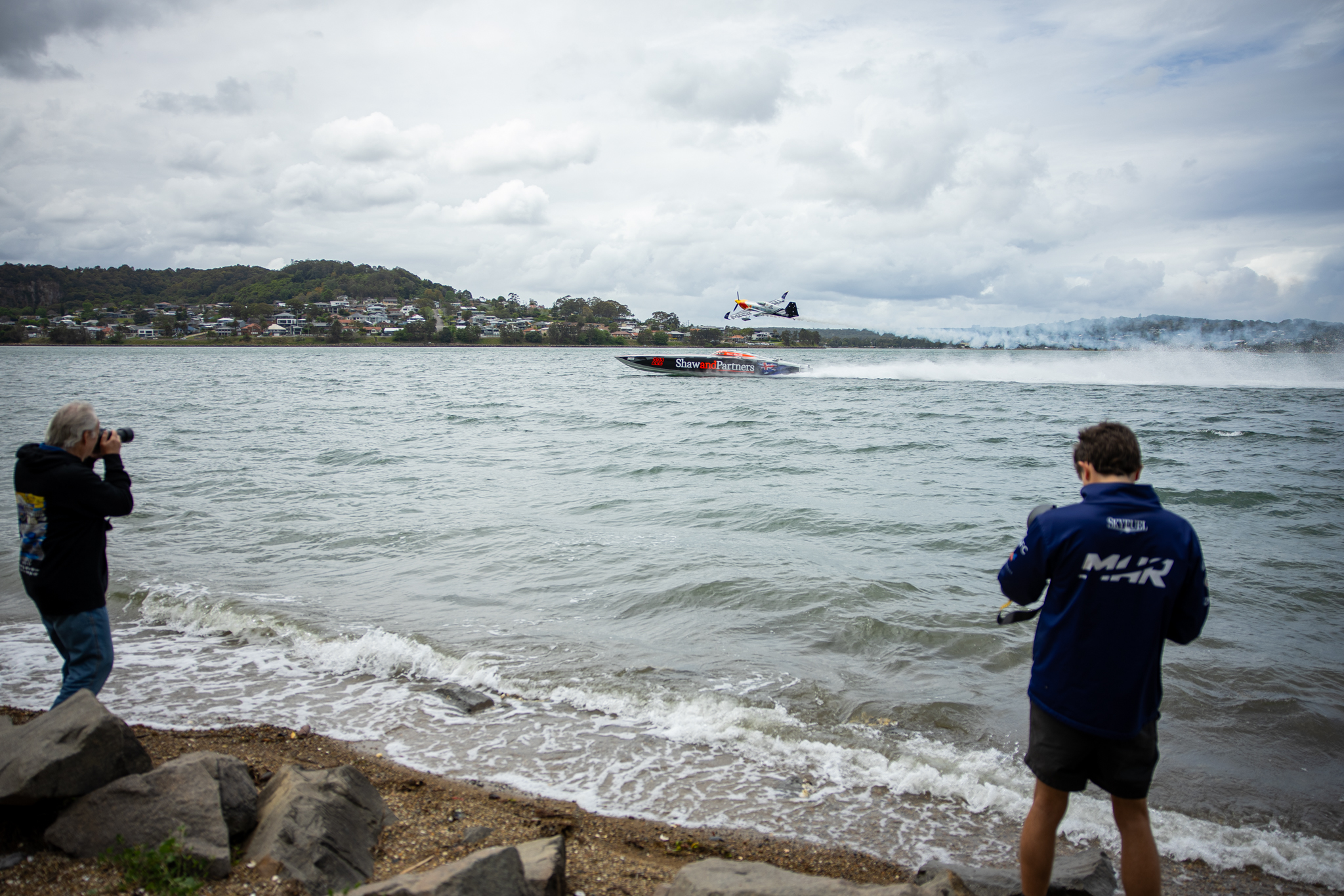 32715_Spectators snap the action off Marmong Point